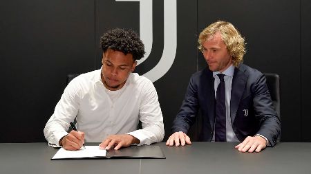 Weston McKennie while signing for Juventus.